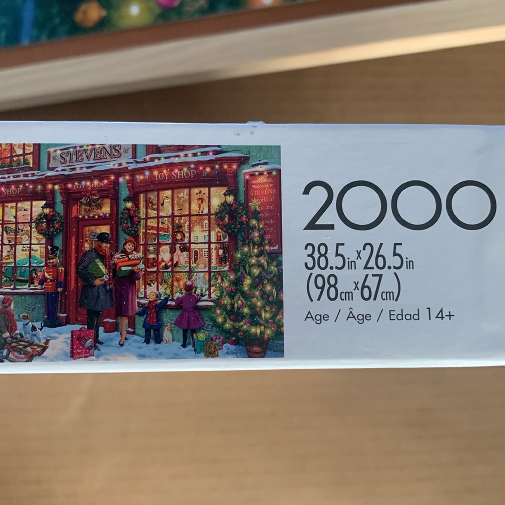Buffalo Games 2000 piece “Christmas Toy Shop” jigsaw puzzle. - Picture 3 of 5